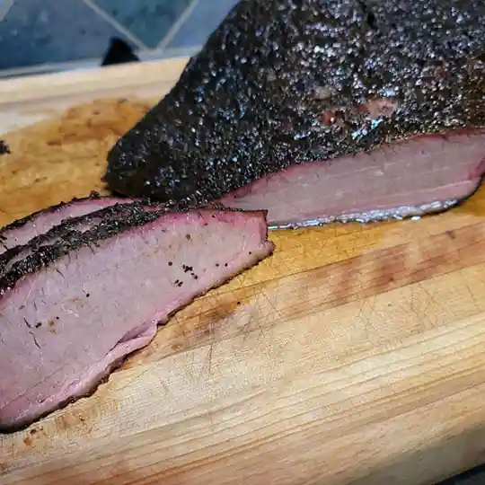 sliced smoked brisket for frisco catering